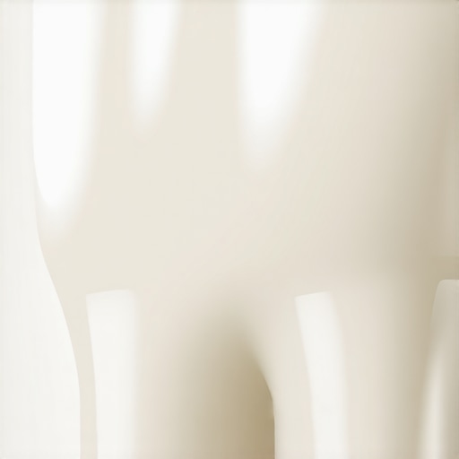 Close-up of clean, polished tooth enamel showing a healthy, glassy texture after professional dental scaling and polishing.