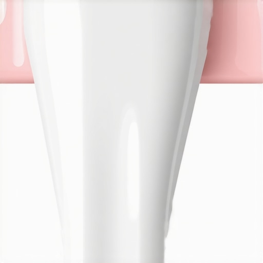 Close up of a tooth showing the color difference between an Invisalign attachment and whitened enamel